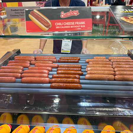 Hot dogs on a roller grill